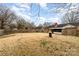 Large, fenced backyard offering privacy and plenty of room for recreation at 4815 Carriage Drive Cir, Charlotte, NC 28205