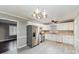 Spacious kitchen featuring stainless steel appliances and light countertops at 4815 Carriage Drive Cir, Charlotte, NC 28205