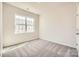 Cozy bedroom with plush carpet and a window, offering a relaxing retreat at 5944 Oak Branch Cir, Maiden, NC 28650