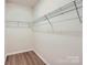 Walk-in closet with custom shelving offering ample storage space and organization at 5944 Oak Branch Cir, Maiden, NC 28650