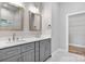 Spacious bathroom featuring double sinks, granite countertops and modern lighting at 6233 Riviera Run Estates Dr, Hickory, NC 28601