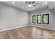 Bedroom with three windows and a ceiling fan at 6233 Riviera Run Estates Dr, Hickory, NC 28601