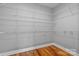 Spacious walk-in closet with built in wire shelving and hardwood floors at 6233 Riviera Run Estates Dr, Hickory, NC 28601