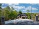 Charming brick home with a spacious driveway, lush greenery, and a two-car garage at 6233 Riviera Run Estates Dr, Hickory, NC 28601