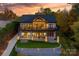 Beautiful brick home featuring outdoor living spaces and manicured lawn at 6233 Riviera Run Estates Dr, Hickory, NC 28601