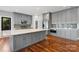 Well-appointed kitchen features an island, stainless steel appliances, and hardwood flooring at 6233 Riviera Run Estates Dr, Hickory, NC 28601