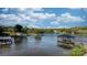 Scenic lake view featuring docks, boathouses and wooded shoreline at 6233 Riviera Run Estates Dr, Hickory, NC 28601