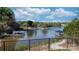 Scenic lake view featuring docks, boathouses and wooded shoreline at 6233 Riviera Run Estates Dr, Hickory, NC 28601