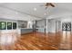Expansive open living space with an island and kitchen featuring hardwood floors and neutral wall colors at 6233 Riviera Run Estates Dr, Hickory, NC 28601