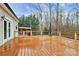 Expansive back deck featuring wood flooring and metal cable railing that is perfect for entertaining guests at 642 Brynwood Dr, Rock Hill, SC 29732