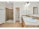 Bathroom featuring double sinks, a glass shower and tile floors at 642 Brynwood Dr, Rock Hill, SC 29732