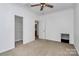 Bright bedroom features neutral carpet, ceiling fan, and closet, offering comfort and functionality at 642 Brynwood Dr, Rock Hill, SC 29732