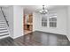 Bright dining room featuring hardwood floors, natural light, and an adjacent kitchen at 642 Brynwood Dr, Rock Hill, SC 29732
