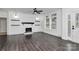 Cozy living room features a modern fireplace, shiplap wall and large windows at 642 Brynwood Dr, Rock Hill, SC 29732