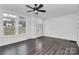 Bright living room featuring hardwood floors, large windows, and a glass front door at 642 Brynwood Dr, Rock Hill, SC 29732