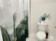 Bathroom featuring a toilet and modern shower curtain at 7711 Bainbridge Rd, Sherrills Ford, NC 28673