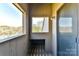Private balcony with unique window and screened door, perfect for relaxing outdoors at 84 Ridgeport Rd # B, Clover, SC 29710