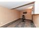 Finished basement space with exercise equipment and patterned carpeting at 84 Ridgeport Rd # B, Clover, SC 29710