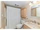 Cozy bathroom featuring a shower, sink, toilet, and vanity storage at 84 Ridgeport Rd # B, Clover, SC 29710