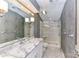 Bathroom featuring marble countertop and a glass enclosed shower at 84 Ridgeport Rd # B, Clover, SC 29710
