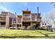 Exterior view of a multi-story home with spacious wooden balconies and mature landscaping at 84 Ridgeport Rd # B, Clover, SC 29710