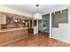 Eat-in kitchen featuring stainless steel appliances, bar seating, and open views of the living areas at 84 Ridgeport Rd # B, Clover, SC 29710
