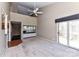 Spacious living room featuring high ceilings, wet bar, and sliding door leading to outdoor space at 84 Ridgeport Rd # B, Clover, SC 29710