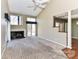 Inviting living room with fireplace, natural light, and open access to dining and kitchen areas at 84 Ridgeport Rd # B, Clover, SC 29710