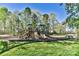 A well-equipped community playground with slides and climbing structures, providing an active outdoor space at 84 Ridgeport Rd # B, Clover, SC 29710