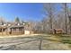 This brick home features an attached garage and a shed in the backyard at 9414 Machado Dr, Indian Trail, NC 28079