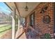 Inviting front porch with seating, providing a cozy outdoor space at 9414 Machado Dr, Indian Trail, NC 28079