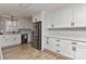 Bright kitchen featuring stainless steel appliances, white cabinets, and subway tile backsplash at 9414 Machado Dr, Indian Trail, NC 28079