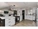 Well-equipped kitchen with a center island that flows into a cozy living space with stylish decor at 9414 Machado Dr, Indian Trail, NC 28079
