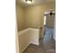 Upstairs hallway featuring access to rooms with carpeted flooring and neutral paint at 9534 Blossom Hill Dr, Huntersville, NC 28078
