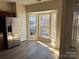 Bright kitchen area featuring hardwood floors, stainless steel appliances, and a bay window at 9534 Blossom Hill Dr, Huntersville, NC 28078