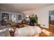 The living room boasts a fireplace with a mantle, built-in bookshelves, and hardwood floors for a cozy aesthetic at 1120 Cumberland Ave, Gastonia, NC 28054