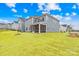 The expansive yard and screened porch provide ample room for outdoor enjoyment at 118 Golden Trl, Mooresville, NC 28115