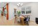 Well-lit dining room with table, chairs, and access to the patio through glass doors at 118 Golden Trl, Mooresville, NC 28115