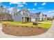 A modern two-story home boasting a well-maintained lawn and contemporary design at 118 Golden Trl, Mooresville, NC 28115