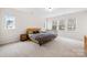 Large main bedroom featuring natural light and ample space, creating a serene retreat at 118 Golden Trl, Mooresville, NC 28115