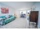 Open-concept living room and dining area with neutral walls and wood floors at 11907 Maria Ester Ct, Charlotte, NC 28277