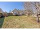 The fenced-in back yard provides privacy and plenty of space to relax or entertain at 125 Round Tuit Ln, Mt Ulla, NC 28125