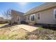 Exterior of home with a concrete patio at 125 Round Tuit Ln, Mt Ulla, NC 28125