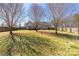 Fenced-in backyard, perfect for outdoor activities and relaxation at 125 Round Tuit Ln, Mt Ulla, NC 28125