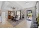 Inviting dining room featuring hardwood floors, an elegant table setting, and abundant natural light at 125 Round Tuit Ln, Mt Ulla, NC 28125