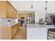 Open-concept kitchen with stainless steel appliances and a quartz countertop island at 125 Round Tuit Ln, Mt Ulla, NC 28125