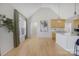 Bright kitchen with lots of floor space, wood cabinets and a quartz countertop island at 125 Round Tuit Ln, Mt Ulla, NC 28125