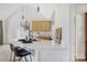 Bright kitchen featuring a quartz countertop island with seating and decorative pendant lights at 125 Round Tuit Ln, Mt Ulla, NC 28125