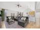 Comfortable and stylish living area featuring modern furnishings, hardwood floors, and an open layout at 125 Round Tuit Ln, Mt Ulla, NC 28125