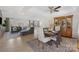 Bright and airy open-concept living space seamlessly connects the living, dining, and kitchen areas at 125 Round Tuit Ln, Mt Ulla, NC 28125